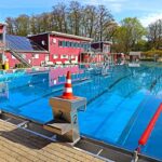 Freibad Elsebad in Schwerte: 50-Meter-Becken mit Sprungbrett und Kinderbereich.
